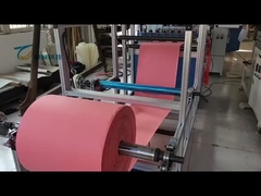 Ligne de production de fente et de plissage de matériaux à cinq couches